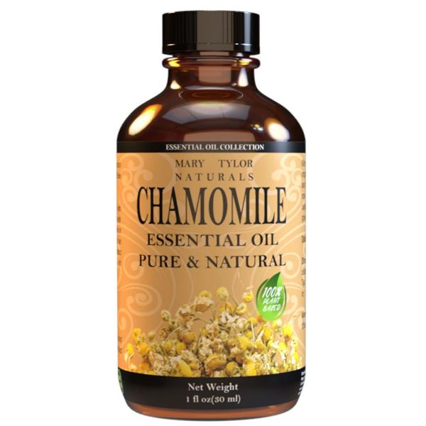Premium Photo  Chamomile essential oil in a small bottle